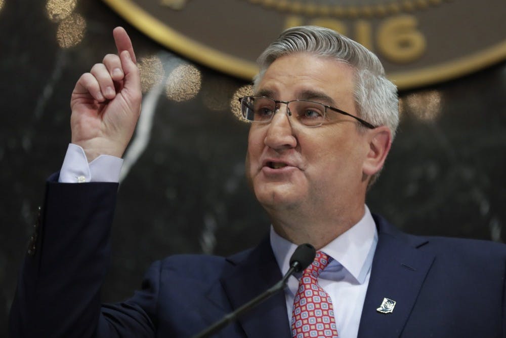In this Jan. 15, 2019, file photo, Indiana Gov. Eric Holcomb speaks at the Statehouse in Indianapolis. The Indiana Senate is moving toward a vote on legislation aimed at getting Indiana off a list of five states without a hate crimes law, even as the bill's critics contend that it falls short of that goal. Senate Republicans decided in a private meeting Monday April 1, 2019, to put the bill up for a final concurrence vote as early as Tuesday. Republican Gov. Holcomb, supports it. (AP Photo/Michael Conroy, File)