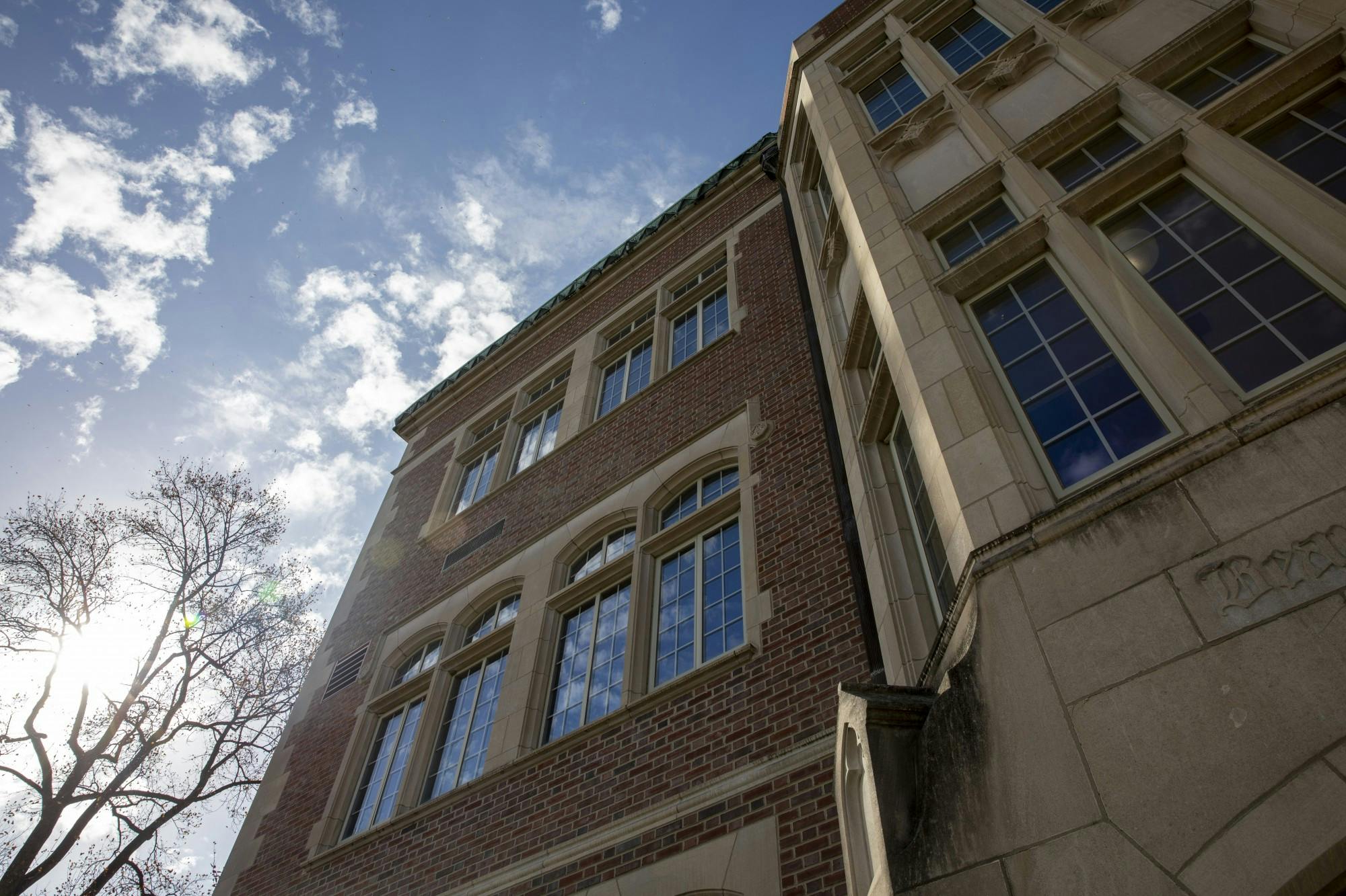 Clouds reflect on the windows of the David Owsley Museum of Art Nov. 10, 2020, in The Quad. Recently, the museum updated its online database to showcase more of its collection. Jacob Musselman, DN