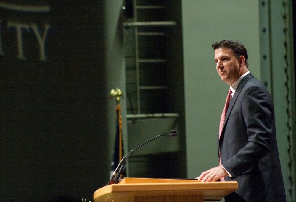 <p>Chairman of the Board of Trustees Richard Hall welcomes the audience on Sept. 8, 2017 at the Installation of Geoffrey S. Mearns in John R. Emens Auditorium. Gov. Eric Holcomb reappointed Hall and R. Wayne Estopinal to the Board of Trustees on Tuesday. <strong>Kaiti Sullivan, DN</strong></p>