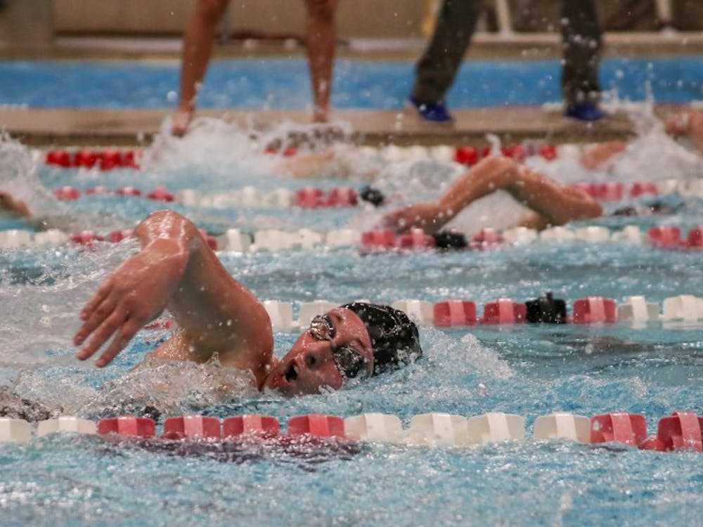 Senior Morgan Brebberman competes in the 200-yard freestyle during the meet against Buffalo Jan. 27 in Lewellen Pool. Brebberman placed fifth with a time of 2:01.25. Kaiti Sullivan, DN