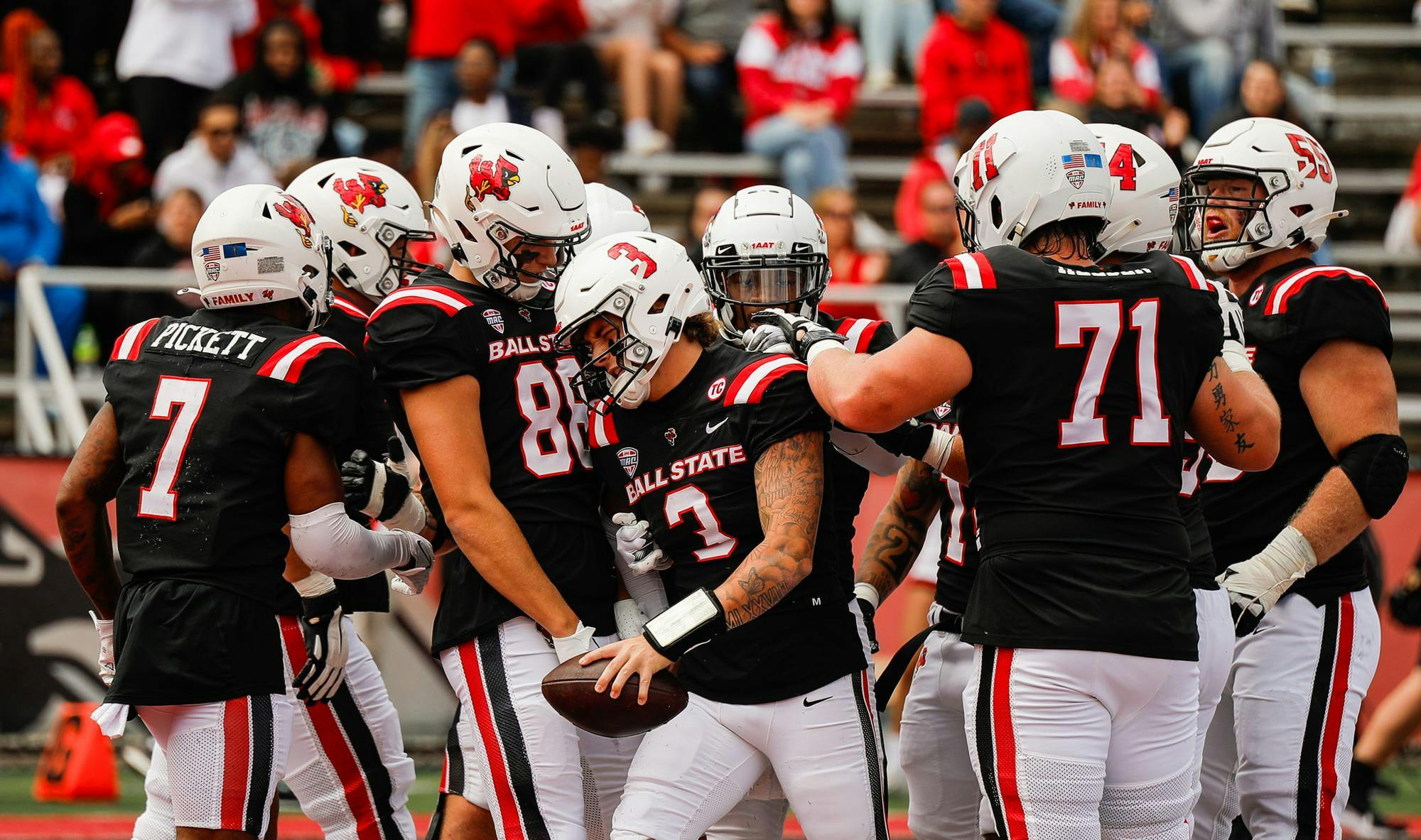 Freshman quarterback Kadin Semonza celebrates with his teammates after scoring a touchdown against Missouri State Sept. 7 at Scheumann Stadium. Andrew Berger, DN 