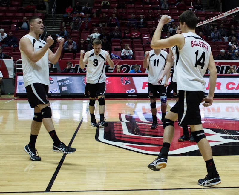 The Ball State men's volleyball team congratulates outside attacker Matt Szews on gaining a point for the team during the fourth set of the match against New Jersey Institute of Technology on Jan. 27 in Worthen Arena. Szews led the team with 11 kills, two aces and five digs. Grace Ramey // DN