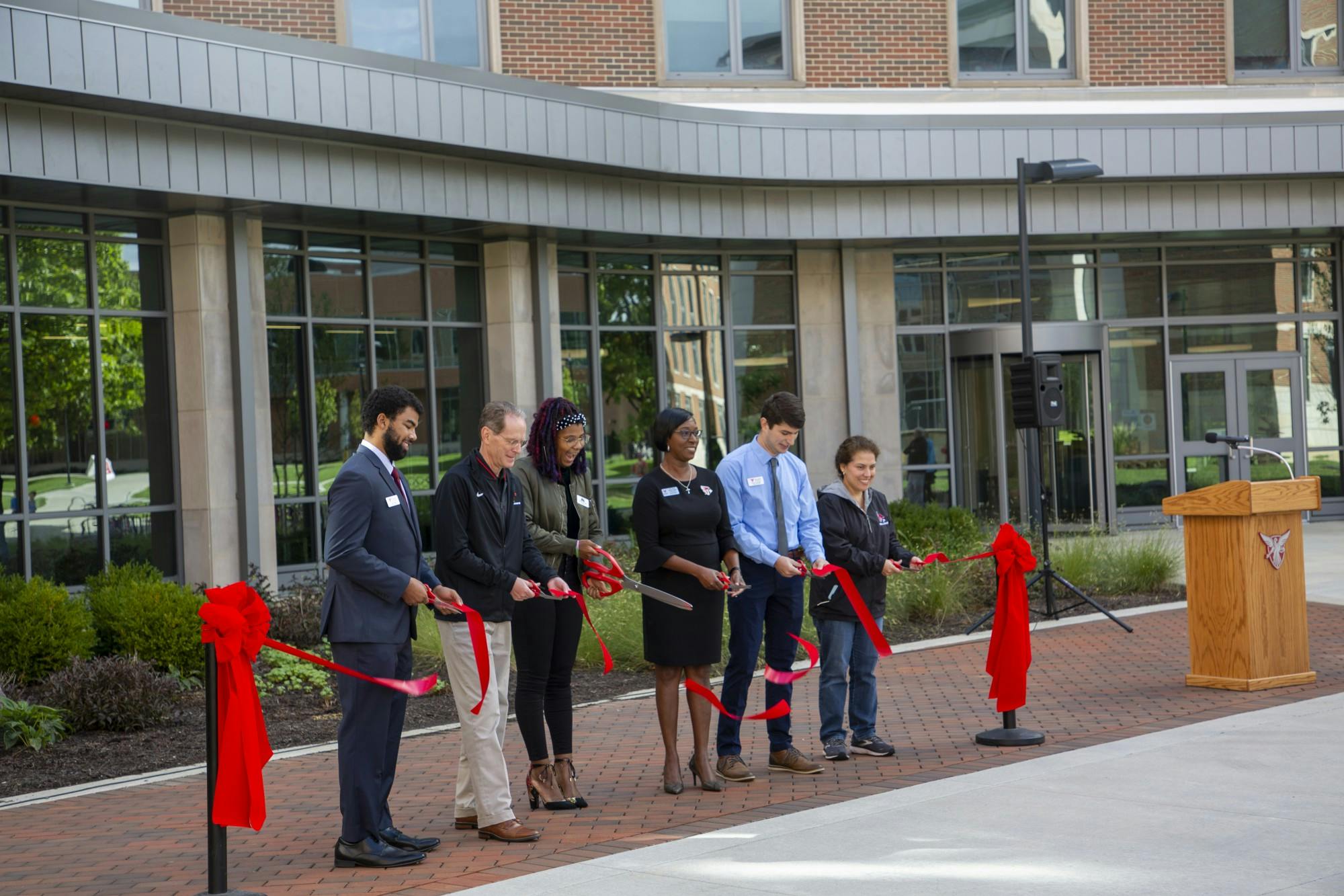 Ball State administrators and residence hall leaders cut the ribbon to inaugurate the north residential neighborhood Sept. 25. The neighborhood&#x27;s renovation began in 2013 and was completed in fall 2021 with the opening of North West Residence Hall. Grace McCormick, DN