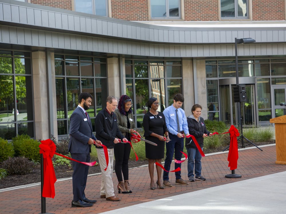 Ball State administrators and residence hall leaders cut the ribbon to inaugurate the north residential neighborhood Sept. 25. The neighborhood&#x27;s renovation began in 2013 and was completed in fall 2021 with the opening of North West Residence Hall. Grace McCormick, DN