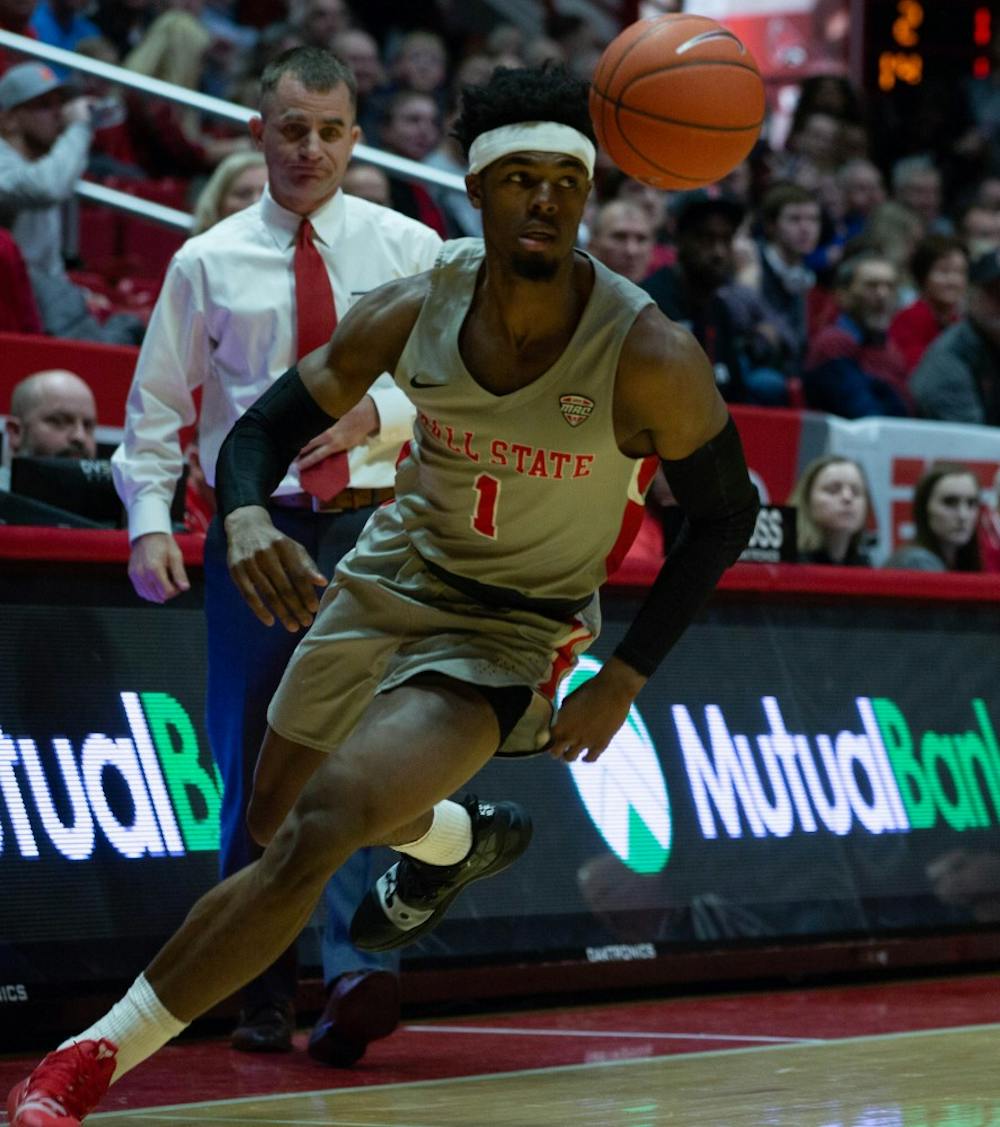 <p>Redshirt junior guard K.J. Walton rushes towards the ball during the game against the University of Akron in John E. Worthen Feb. 16, 2019. The Zips fell to the Cardinals 57-56. <strong>Scott Fleener, DN</strong></p>