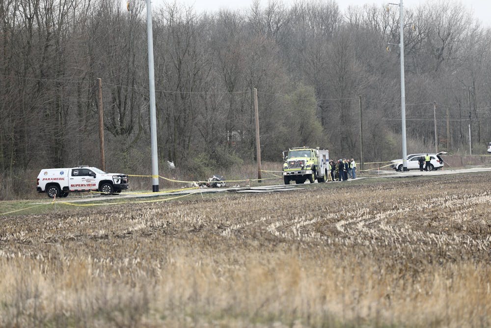 Emergency vehicles surround the site of a plane crash April 1 in Muncie, Indiana. Mya Cataline, DN 