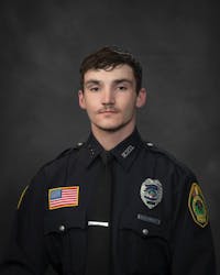 Muncie Police Officer Josiah Mauller posing for a work-based portrait. Photo courtesy of City of Muncie