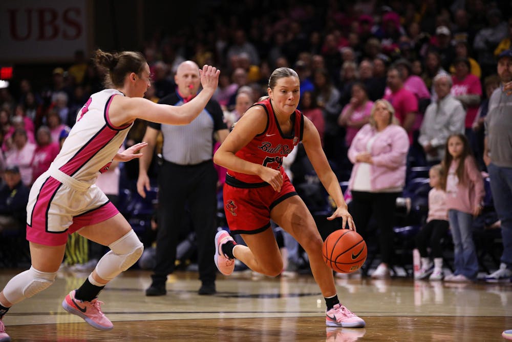 <p>Junior Madelyn Bischoff dribbles the ball down the court against Toledo Feb. 24 at Savage Arena in Toledo, Ohio. Mya Cataline, DN</p>