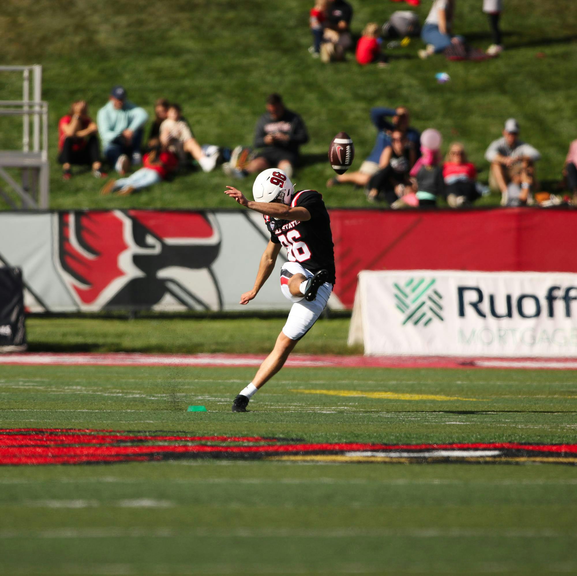 Carson Holmer punts the ball in a game against Missouri State Sept. 7 at Scheumann Stadium. Jeffrey Dreyer, DN