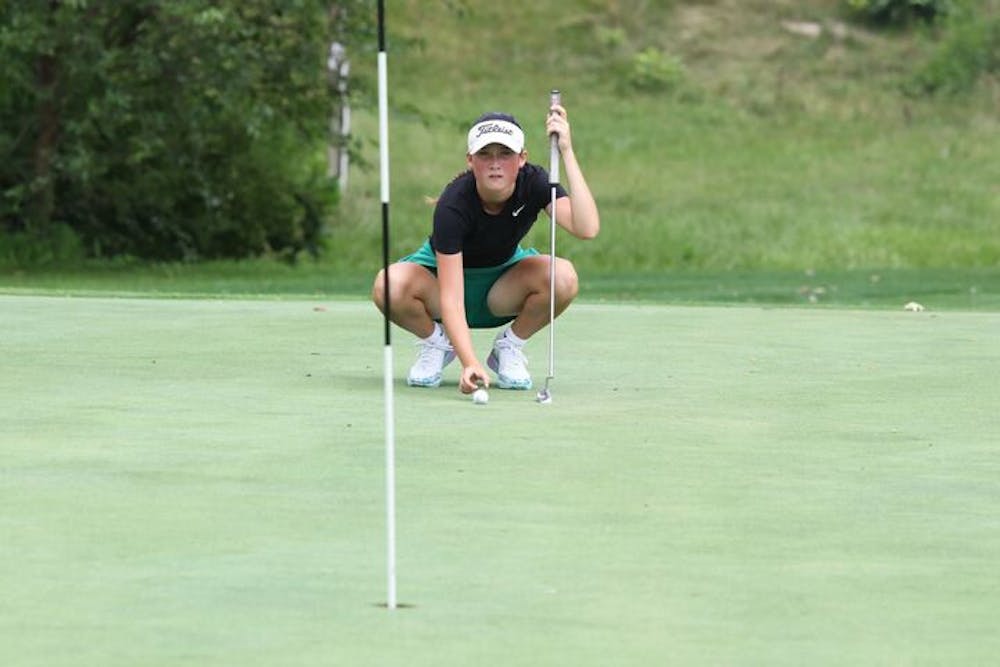 Yorktown senior Kayleigh Agugliaro prepares to putt Aug. 12 at Muncie Elks Golf Course. Zach Carter, DN