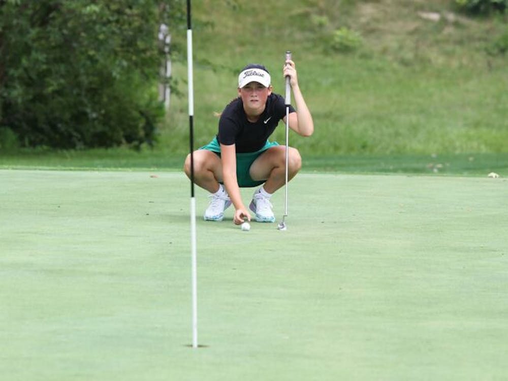 Yorktown senior Kayleigh Agugliaro prepares to putt Aug. 12 at Muncie Elks Golf Course. Zach Carter, DN