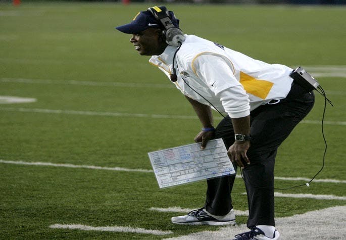 Kent State head coach Darrell Hazell smiles as he watches his team score against Towson in the first  quarter at Dix Stadium on Thursday, August 30, 2012, in Kent, Ohio. (Michael Chritton/Akron Beacon Journal/MCT)