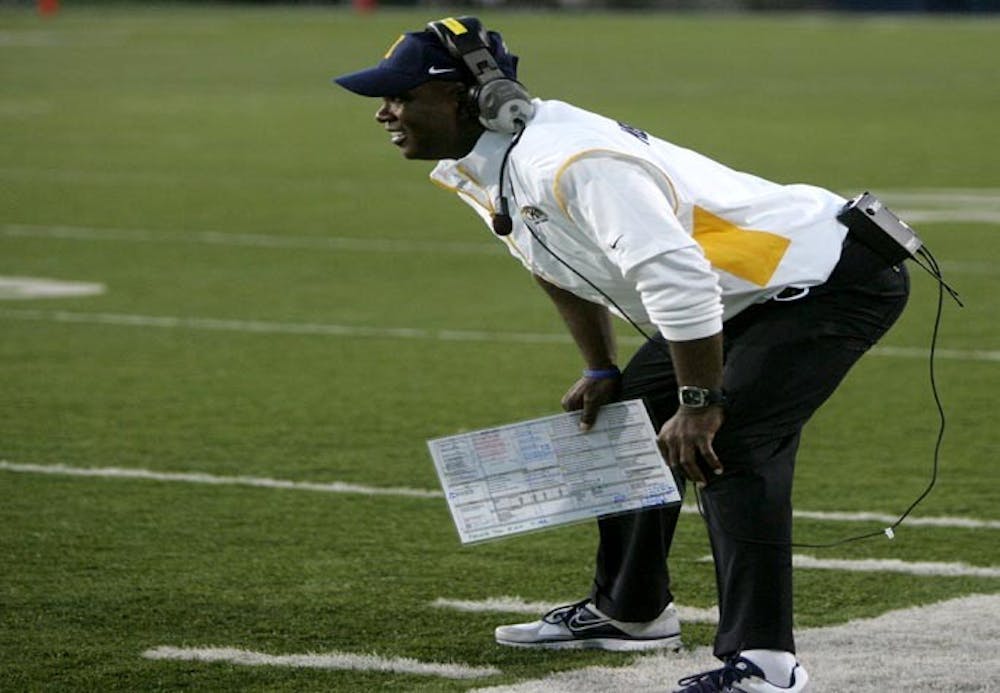 Kent State head coach Darrell Hazell smiles as he watches his team score against Towson in the first  quarter at Dix Stadium on Thursday, August 30, 2012, in Kent, Ohio. (Michael Chritton/Akron Beacon Journal/MCT)