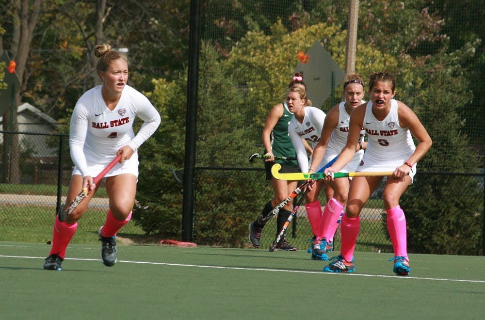 Freshman Emily Koronko and junior Bethany Han sprint toward the ball in the game against Michigan State on Oct. 12 at the Briner Sports Complex. DN PHOTO KAITI SULLIVAN