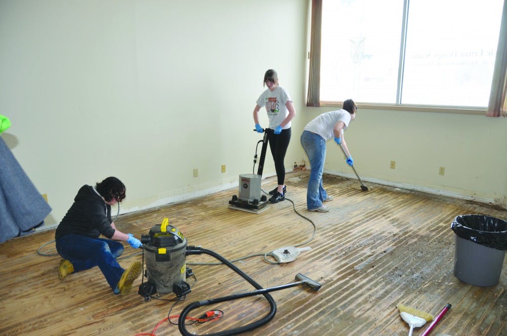 Morganne Walker, Ellen Forthofer and Shannon Buchanan work to renovate a building downtown as part of a College of Architecture and Planning project. The building may be used as a place where Ball State students and the Muncie community can collaborate on projects. PHOTO PROVIDED BY ELLEN FORTHOFER