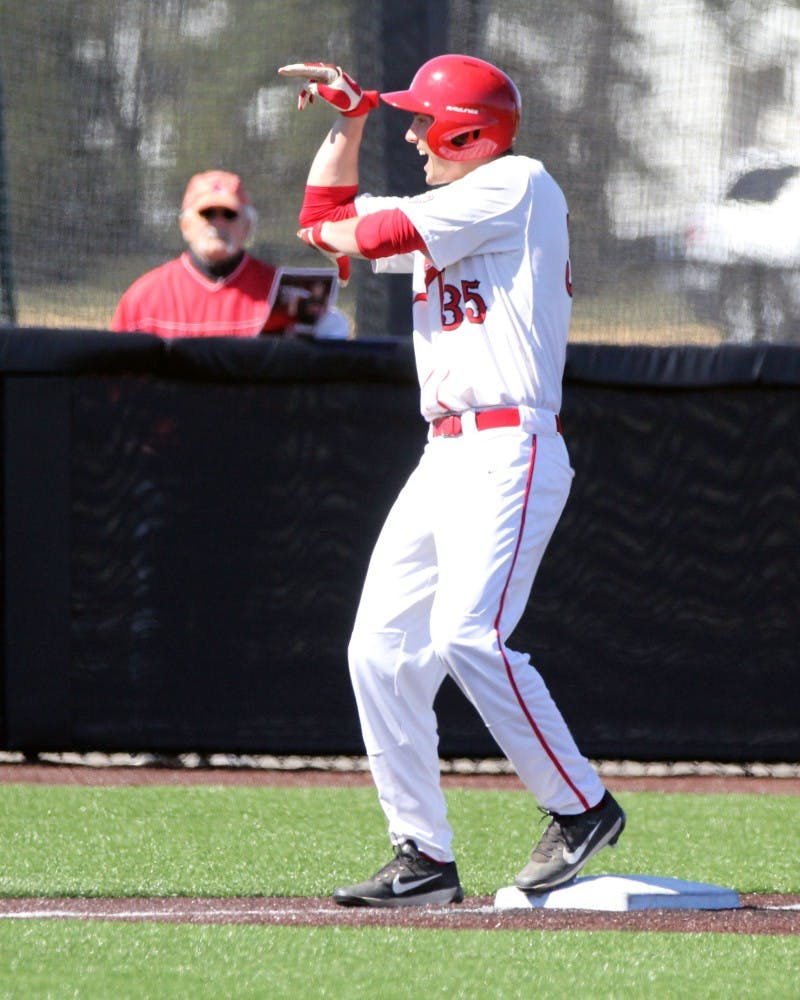 Right fielder Matt Eppers celebrates a triple in the first inning during the Cardinals’ game against Purdue on March 22 at Ball Diamond. Ball State lost 16-4. Paige Grider // DN