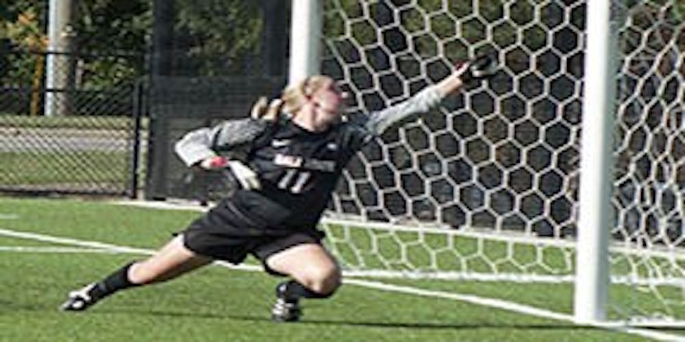 Goalie Layne Schramm dives to save a shot against Illinois on Aug. 26, 2011. Schramm and Dennis both had goal time in the past weekend’s games. DN FILE PHOTO RAFAELA ELY