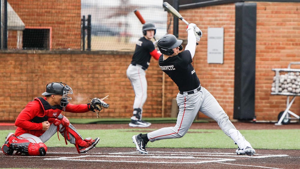 <p>A Ball State baseball player swings at a pitch during a practice scrimmage Jan. 26 at First Merchants Ballpark Complex. Andrew Berger, DN </p>