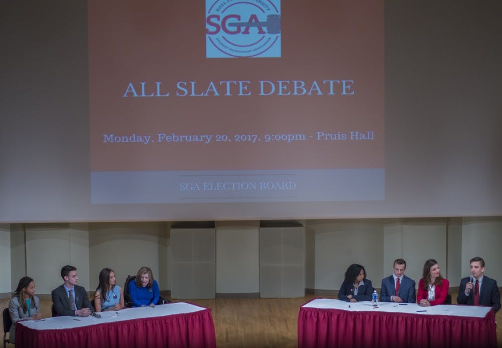 IGNITE and OPTiC speak at the All Slate Debate on Feb. 20 in John J. Pruis Hall. These are the slates running for 2017-18 SGA executive board. Teri Lightning Jr., DN