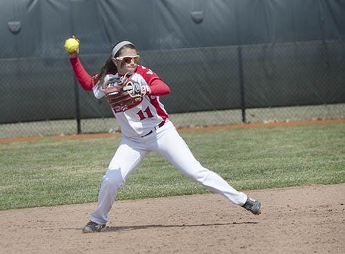 Selena Reyna the short stop fields the ball during the game. A series of low ground balls didn't tally up for either team. DN PHOTO COREY OHLENKAMP
