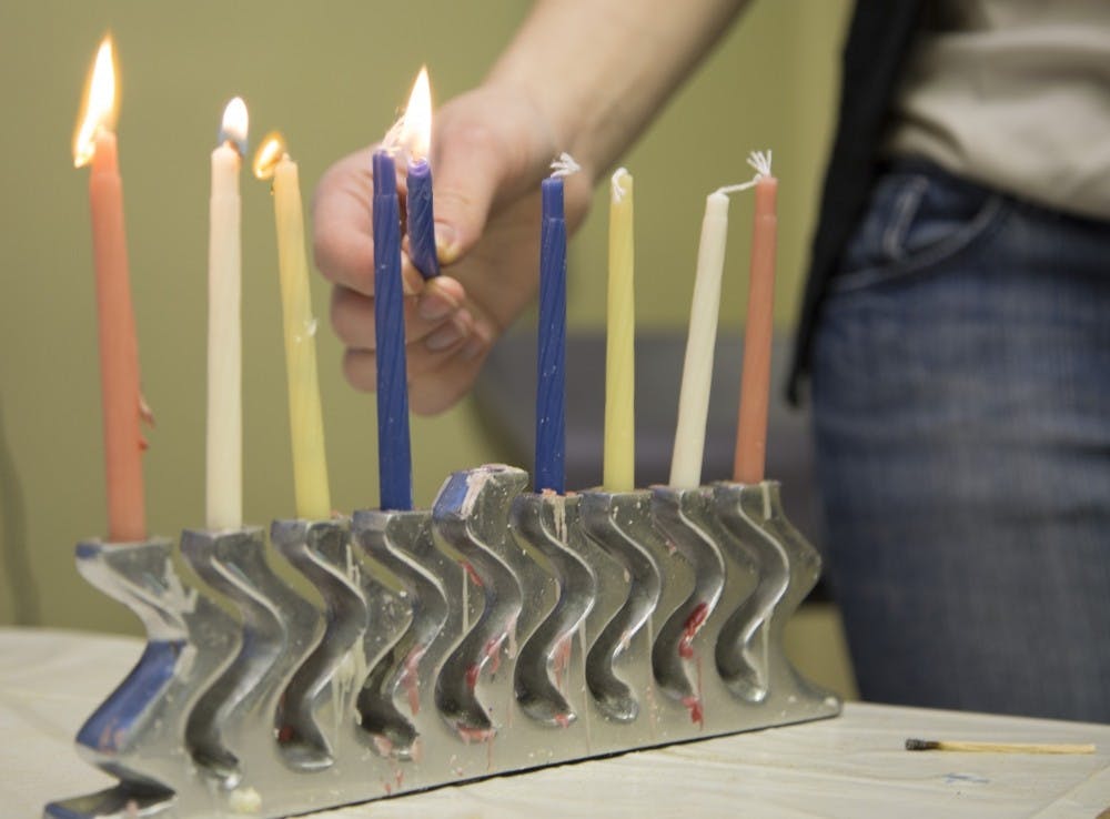 <p>Ball State students of different religions gathered in the Multicultural Center Dec. 3, 2016 for a Hanukkah Party hosted by Hillel, a Jewish campus organization. <strong>Sara Barker, DN File</strong></p>