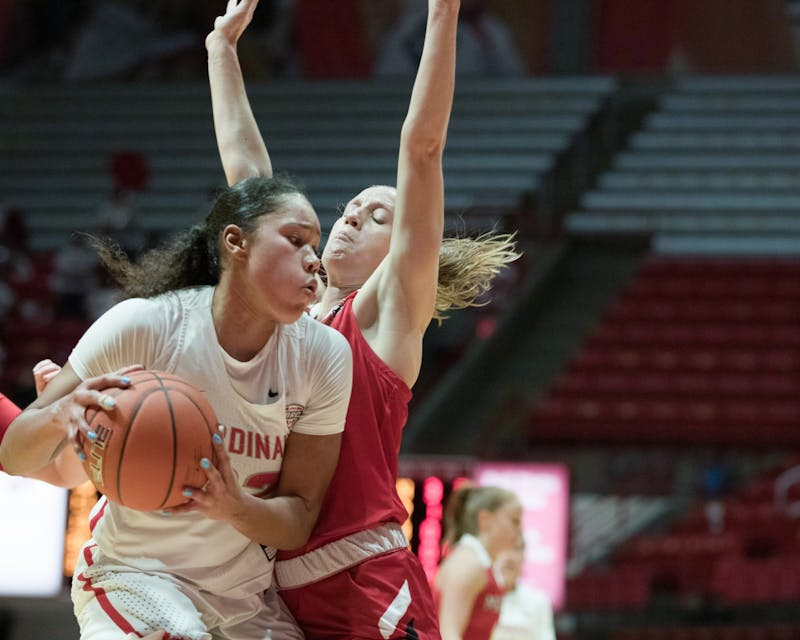 Senior forward Oshlynn Brown gets guarded by a Miami Redhawks defender Jan. 27, 2021, at John E. Worthen Arena. The Cardinals took the win 85-82. Grace Walton, DN