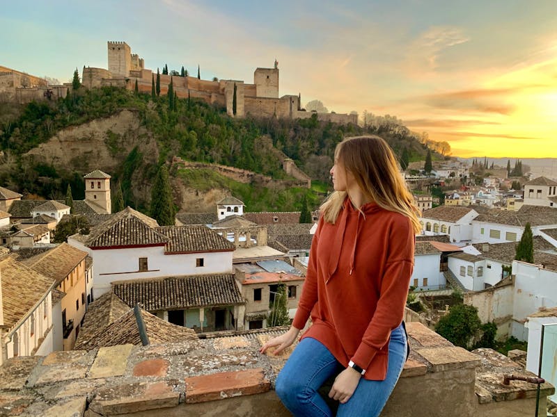 In this March 2020 photo, Liz Rieth, junior journalism and Spanish major, looks out at the Alhambra Palace in Granada, Spain. Rieth returned home to Indiana from her study abroad program in Granada in early March. Liz Rieth, Photo Provided