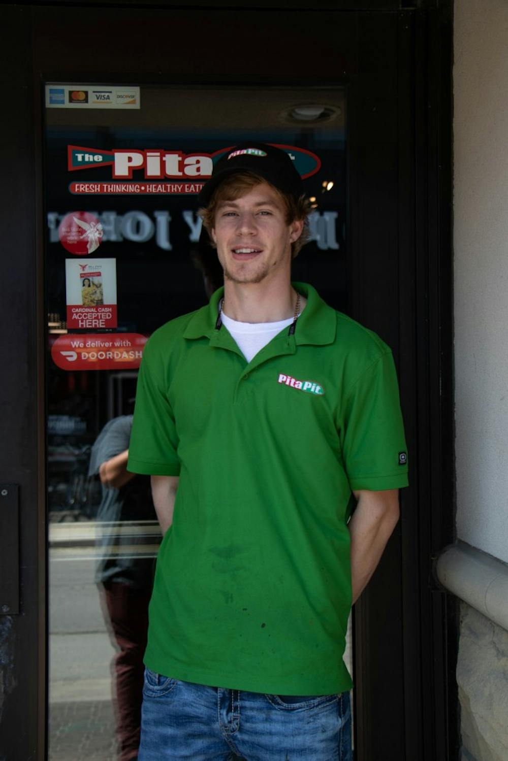 <p>Pita Pit owner, Dain Peters, stands in front of his new restaurant in The Village, Sept. 9, 2019. Peters owns multiple Pita Pits around the Midwest. <strong>Jacob Musselman, DN</strong></p>