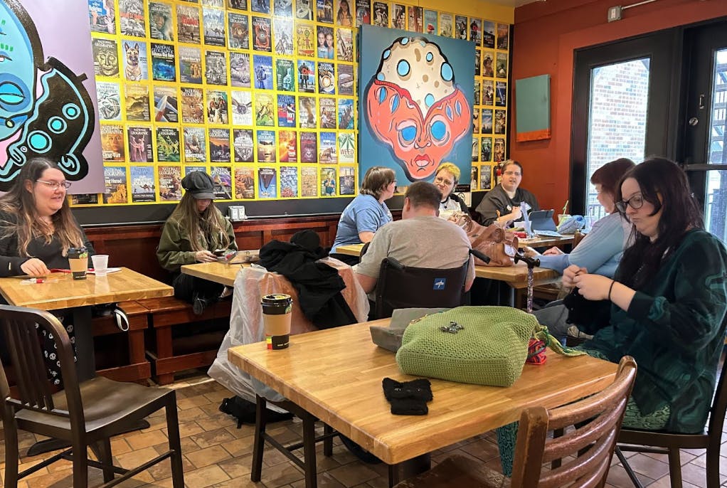 Participants at the Muncie Stitch N’ Bitch are doing a variety of crafts, including sewing, crocheting, and cross-stitching.

Daniel Huber, NewsLink Indiana