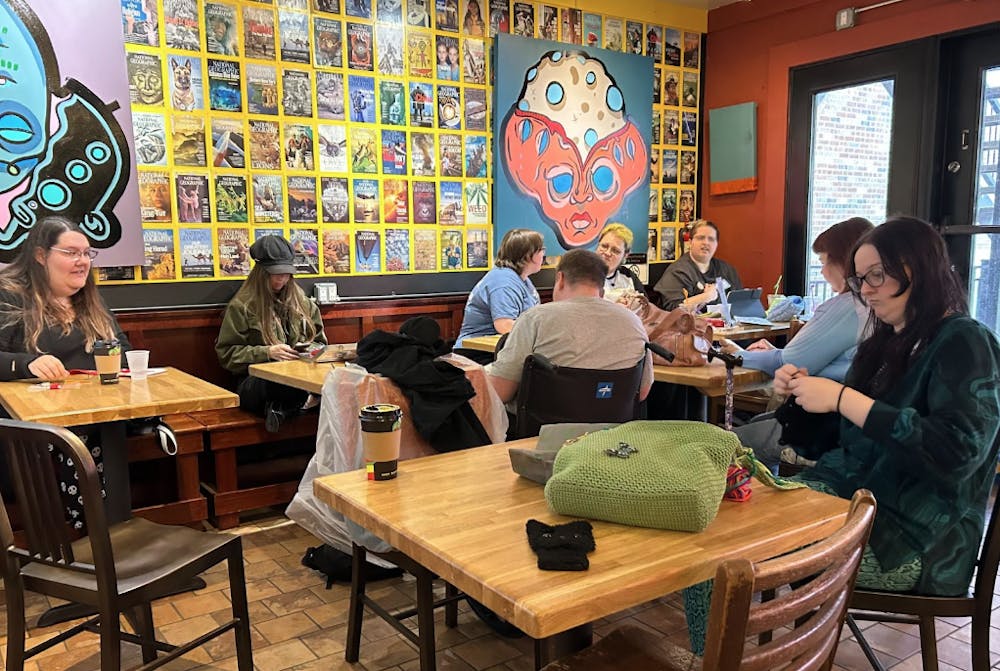 Participants at the Muncie Stitch N’ Bitch are doing a variety of crafts, including sewing, crocheting, and cross-stitching.

Daniel Huber, NewsLink Indiana