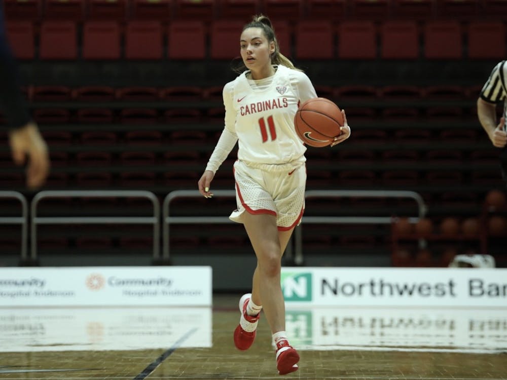 Cardinals sophomore guard Sydney Freeman dribbles the ball down the court Feb. 6, 2021, at John E. Worthen Arena. The Cardinals lost 89-84 to the Zips. Jacob Musselman, DN 