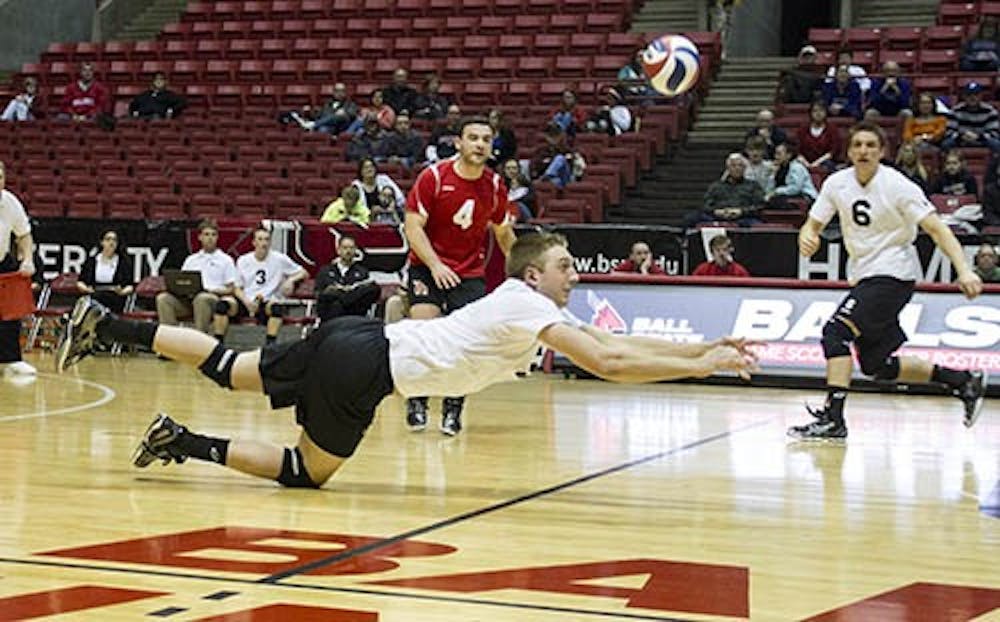 Junior Graham McIlvaine dives for the ball from Grand Canyon on Feb. 10 in Worthen Arena. DN PHOTO EMMA FLYNN