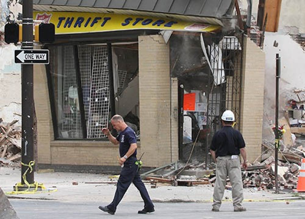 Crews work to raze what remains of the Salvation Army Thrift Store in Philadelphia. The city deemed they are not responsible for the deaths of six people when a crane operator caused the building’s collapse. MCT PHOTO