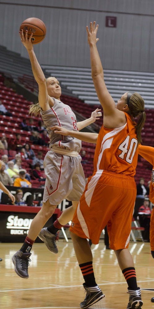 Junior guard Brittany Carter catches a pass from a teammate right before lobbing the ball to Jill Morrison during the Jan. 15 game against Bowling Green at Worthen Arena. DN PHOTO BREANNA DAUGHERTY