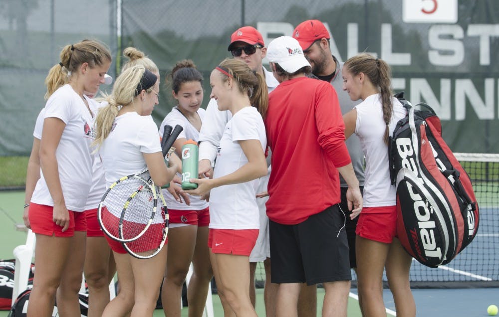 The Ball State women's tennis team huddles up at the end of the doubles match against Butler for the Fall Dual on Sept. 20 at the Cardinal Creek Tennis Center. DN PHOTO BREANNA DAUGHERTY 