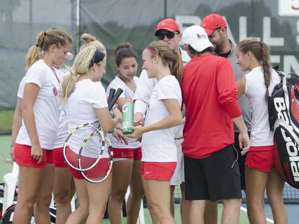 The Ball State women's tennis team huddles up at the end of the doubles match against Butler for the Fall Dual on Sept. 20 at the Cardinal Creek Tennis Center. DN PHOTO BREANNA DAUGHERTY 