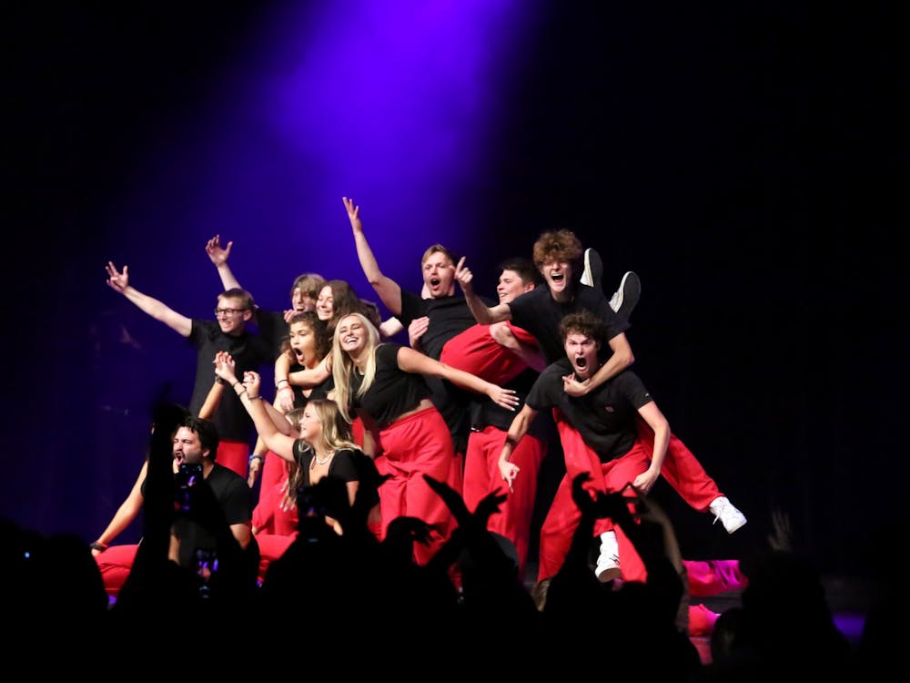 Ball State students performing at Air Jam pose at the end of their routine on Oct. 21, 2021, at Emens Auditorium in Muncie, IN. Amber Pietz, DN