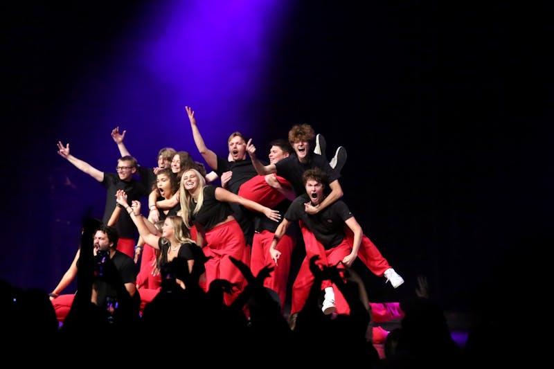 Ball State students performing at Air Jam pose at the end of their routine on Oct. 21, 2021, at Emens Auditorium in Muncie, IN. Amber Pietz, DN