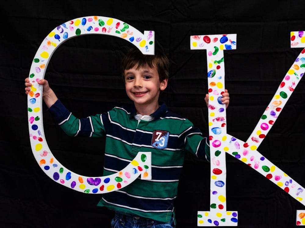 A Camp Kesem attendee, nicknamed "Cheese Pizza," holds letters at the annual Make the Magic Gala fundraiser. This year, Camp Kesem will hold an online summer program to prevent the spread of COVID-19. Audrey Williams, Photo Provided