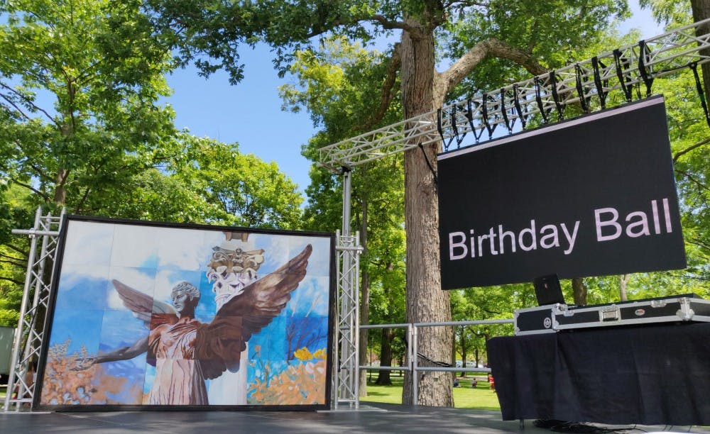 <p>The "Beneficence Mural" stands on stage after being presented at the Centennial Closing celebrations June 14, 2019, at the Quad. President Geoffrey Mearns sent out a campus-wide email asking the campus community for suggestions regarding its location. <strong>Rohith Rao, DN</strong></p>