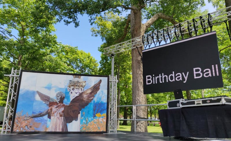 The "Beneficence Mural" stands on stage after being presented at the Centennial Closing celebrations June 14, 2019, at the Quad. President Geoffrey Mearns sent out a campus-wide email asking the campus community for suggestions regarding its location. Rohith Rao, DN