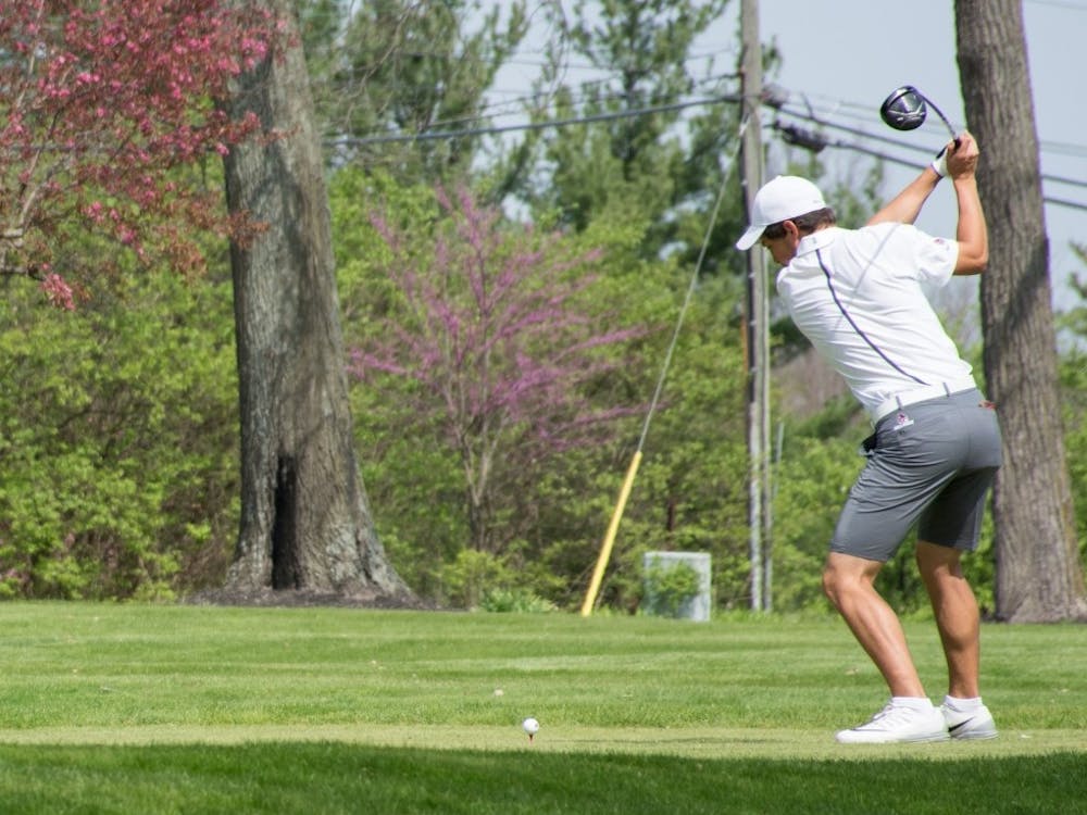Junior Michael Makris swings at the ball on hole 11 during the Earl Yestingsmeier Memorial Invitational on April 14 at the Delaware Country Club. Makris lead the Cardinals 69 and 71 in his first two rounds. Kaiti Sullivan, DN File