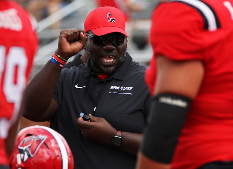 Offensive line coach Colin Johnson runs the offensive line through drills before Ball State's game against Fordham on Saturday, Sept. 7, 2019 at Scheumann Stadium. Ball State won 57-29. Paige Grider, DN
