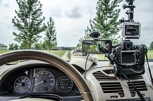 The view of the dashboard of Jason Berry’s car that he would normally see while chasing storms includes photography/video and storm tracking equipment. The group also uses a mobile weather lab to gather scientific data for later use. DN PHOTO COREY OHLENKAMP