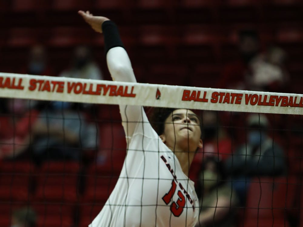 Junior outside hitter Natalie Mitchem (13) hits the ball at Toledo at Worthen Arena Oct. 19. Mitchem had a season high of 21 kills against the Rockets. Jacy Bradley, DN