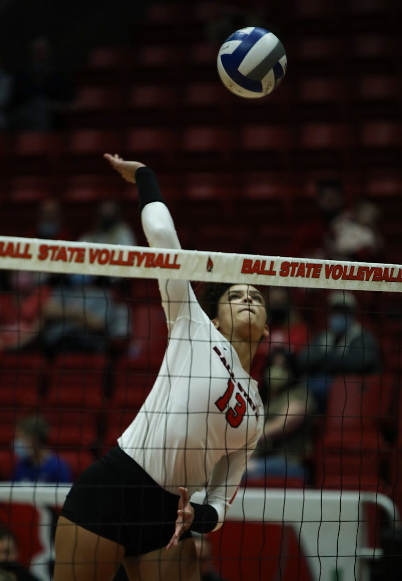 Junior outside hitter Natalie Mitchem (13) hits the ball at Toledo at Worthen Arena Oct. 19. Mitchem had a season high of 21 kills against the Rockets. Jacy Bradley, DN