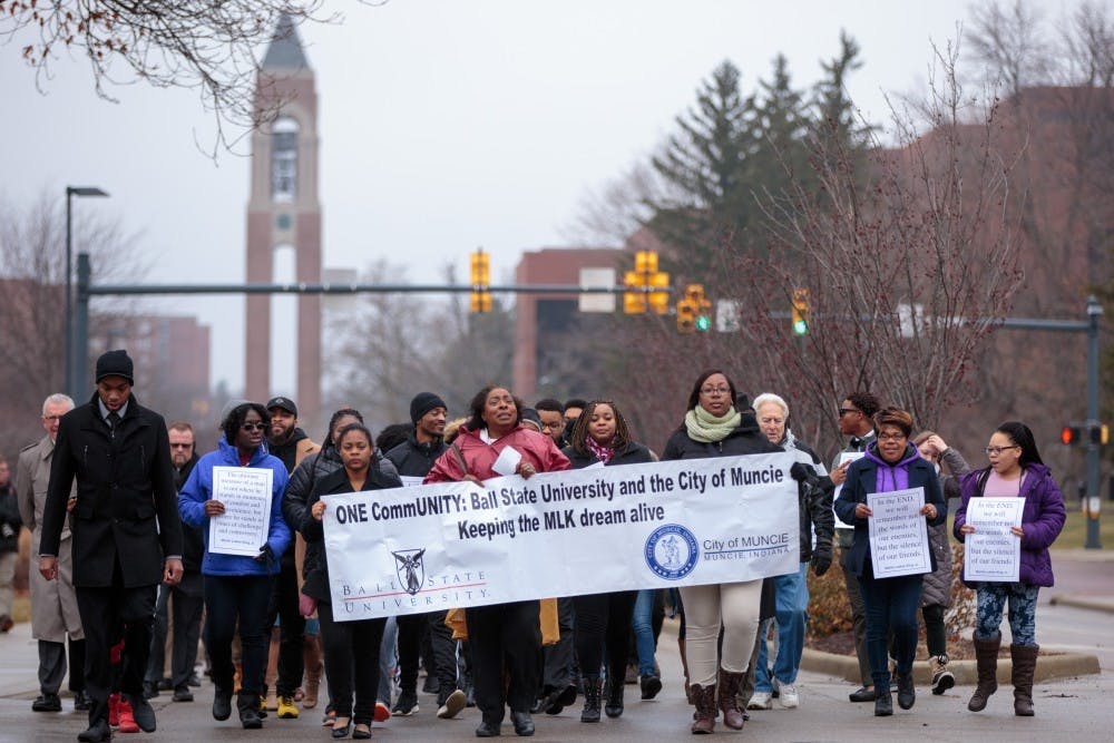 Ball State students and Muncie community members march on McKinley Avenue for the Unity March, Jan. 16, 2017. This year's Unity March was canceled due to the COVID-19 pandemic, but Ball State will still welcome guest speakers via Zoom and host events for Unity Week. Kyle Crawford, DN File