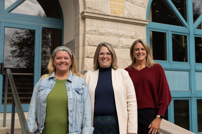 (left to right) Jenni Flanagan, Charity Coffman, and Rhonda Wilson pose for a photo Oct. 16 outside the Administrative Building. Engagement, Wellbeing and Culture provides help for Ball State employees. Isabella Kemper, DN