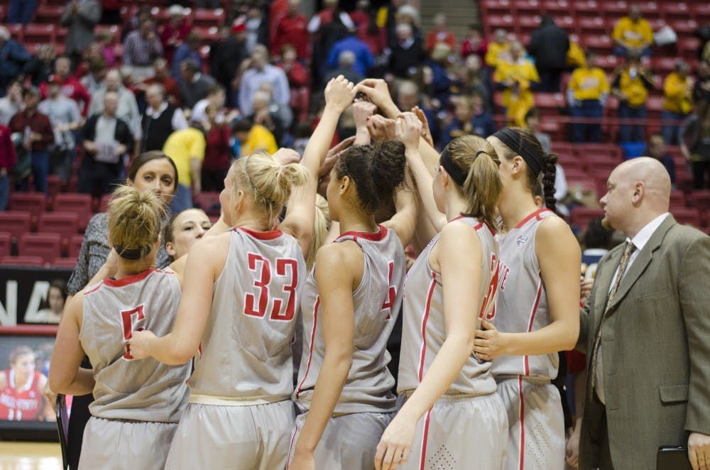 The women's basketball team forms a huddle at the end of the game against Toledo on March 8 at Worthen Arena. Ball State won 69-56. DN PHOTO BREANNA DAUGHERTY 