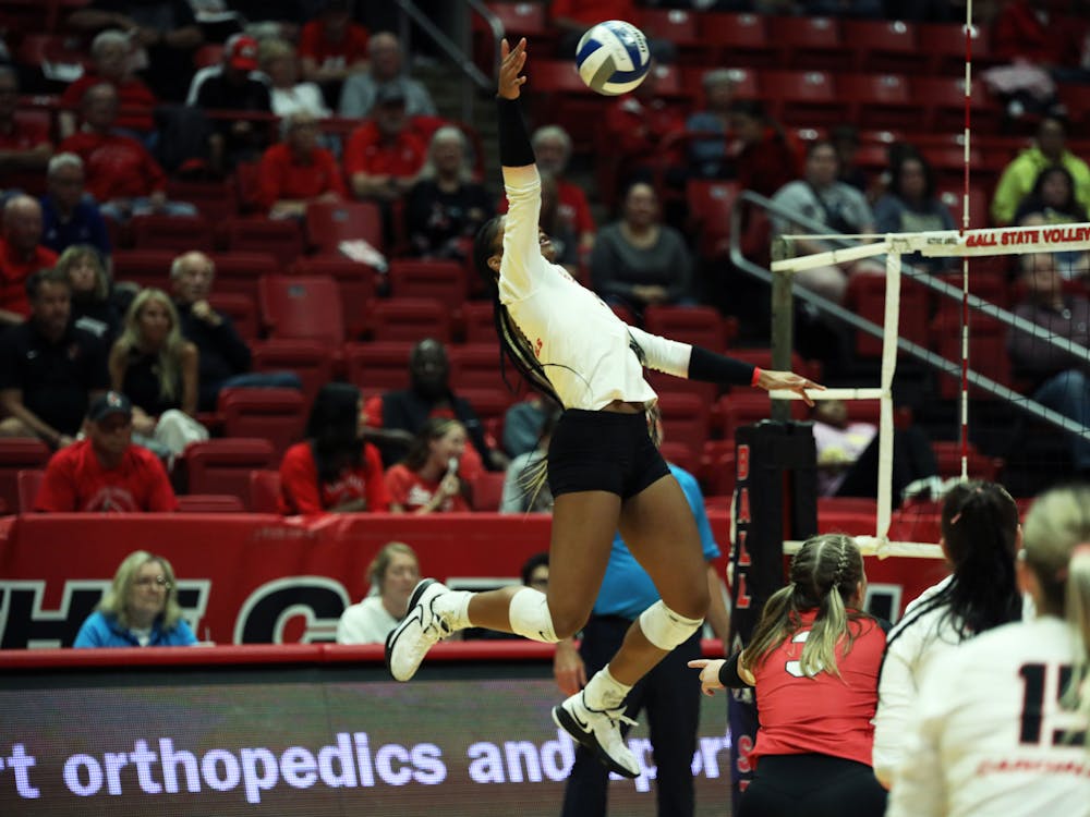 Redshirt Freshman middle blocker Aniya Kennedy spikes the ball against Kent State Oct. 27 at Worthen Arena. Kennedy scored 13 points in the game. Mya Cataline, DN